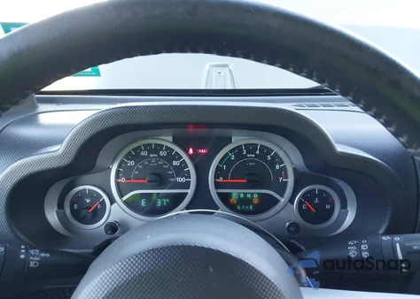 2009 Jeep Wrangler Unlimited Sahara z USA, uszkodzony, nr VIN 1J4GA59189L710032